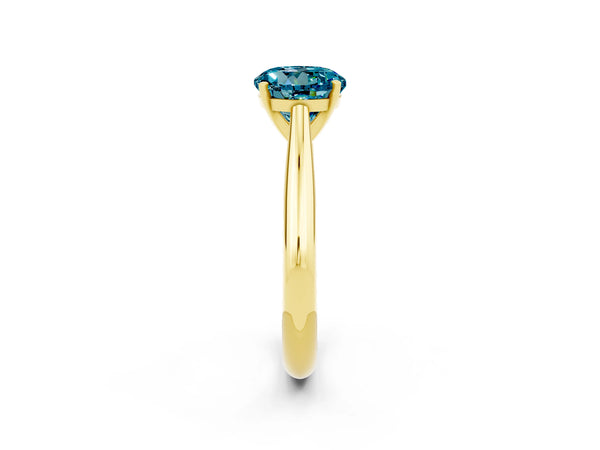 Yellow gold Round Cut Blue Topaz Solitaire Engagement Ring with Cathedral Setting and Four-Prong Mount