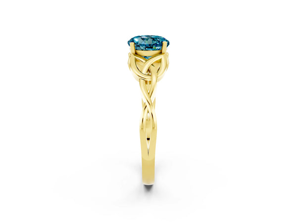 Yellow gold Round Cut Blue Topaz Solitaire Engagement Ring with Celtic Knot Band and Four-Prong Setting