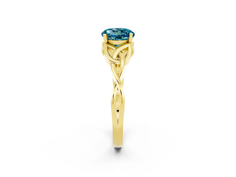 Yellow gold Round Cut Blue Topaz Solitaire Engagement Ring with Celtic Knot Band and Four-Prong Setting_2