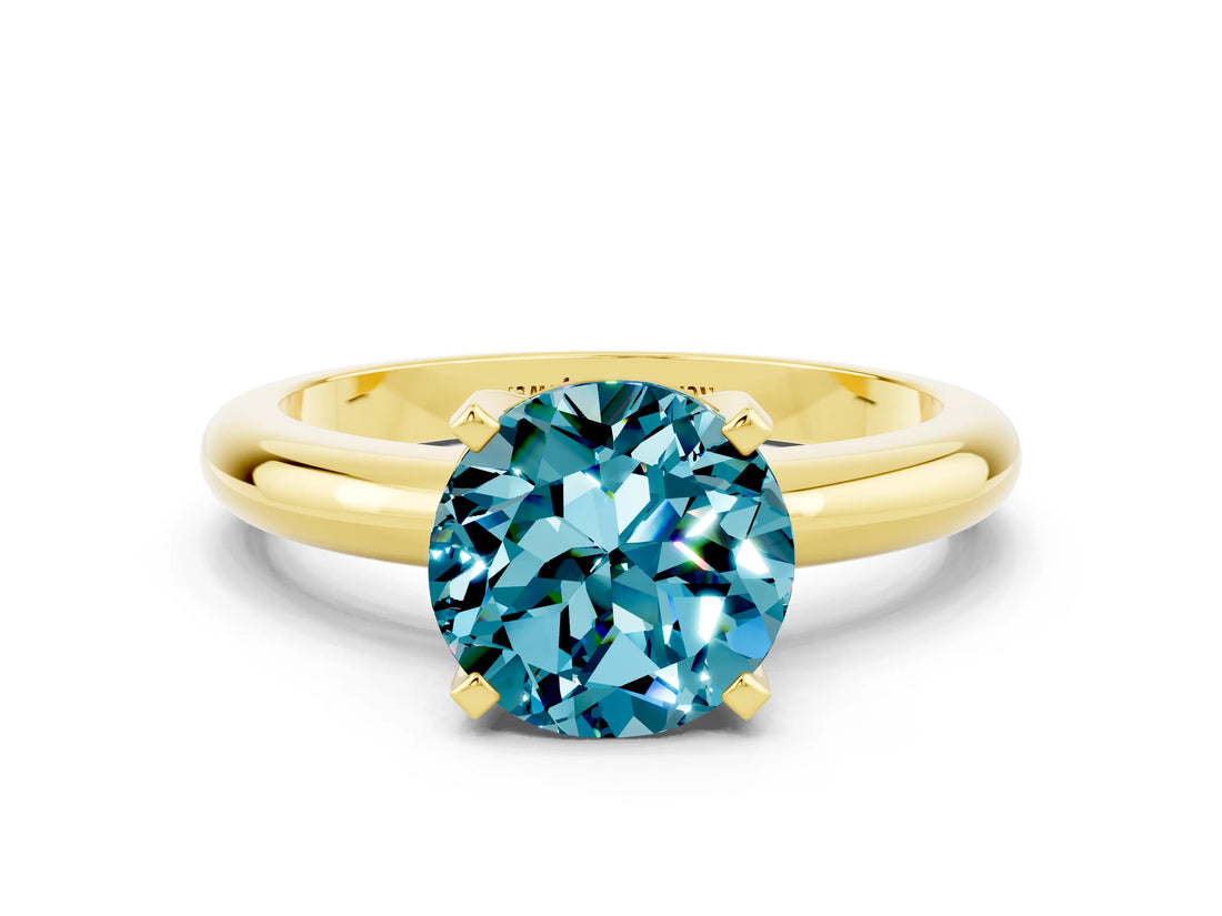 Yellow gold Round Cut Blue Topaz Solitaire Engagement Ring with Round Band and Four-Prong Setting