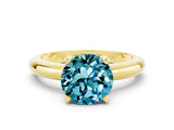 Yellow gold Round Cut Blue Topaz Solitaire Engagement Ring with Round Band and Four-Prong Setting