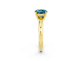 Yellow gold Round Cut Blue Topaz Solitaire Engagement Ring with Round Band and Four-Prong Setting_2