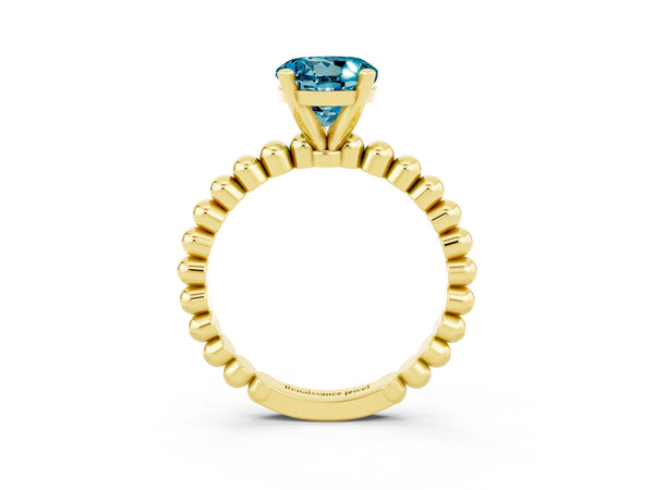 Yellow gold Round Cut Blue Topaz Solitaire Ring with Beaded Band and Prong Setting