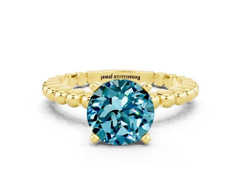 Yellow gold Round Cut Blue Topaz Solitaire Ring with Beaded Band and Prong Setting