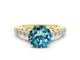 Yellow gold Round Cut Blue Topaz Solitaire Ring with Cathedral Setting and Pavé Band