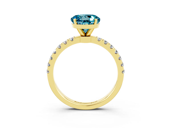Yellow gold Round Cut Blue Topaz Solitaire Ring with Pavé Accents and Four-Prong Setting