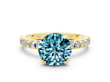 Yellow gold Round Cut Blue Topaz Solitaire Ring with Pavé Band and Four-Prong Setting_36