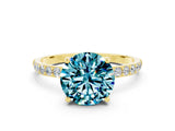 Yellow gold Round Cut Blue Topaz Solitaire Ring with Pave Band and Four Prong Setting_24