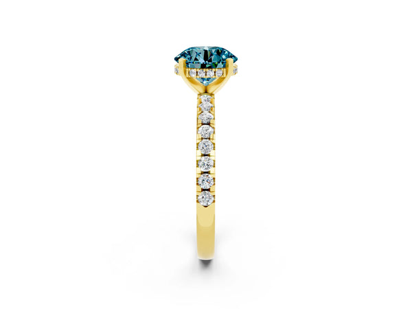 Yellow gold Round Cut Blue Topaz Solitaire Ring with Round Pavé Band and Four-Prong Setting