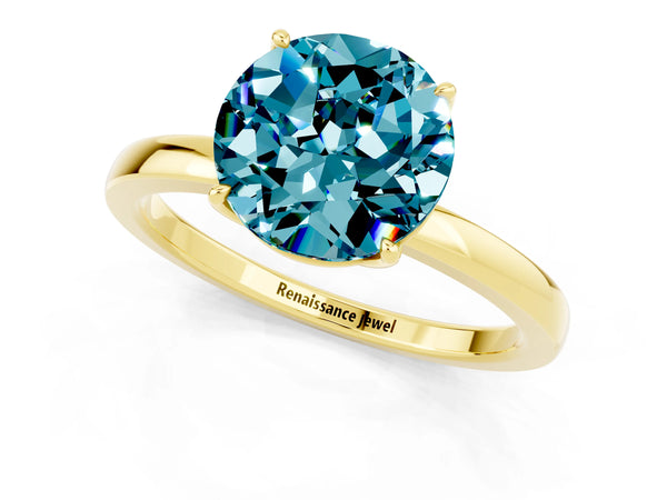 Yellow gold Round Cut Blue Topaz Solitaire Ring with Thin Band and Prong Setting