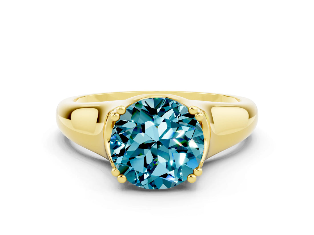 Yellow gold Round Cut Blue Topaz Solitaire Ring with Wide Band and Prong Setting