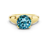 Yellow gold Round Cut Blue Topaz Solitaire Ring with Wide Band and Prong Setting