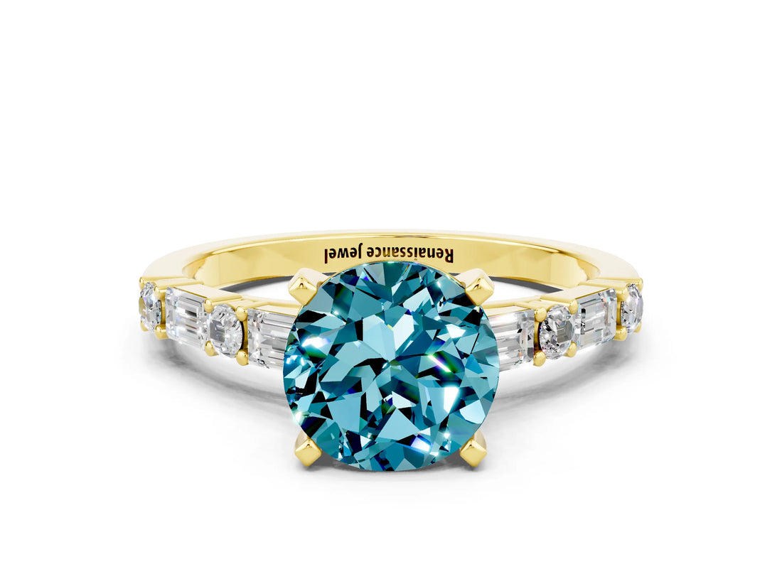 Yellow gold Round Cut Blue Topaz Solitaire with Side Baguettes and Channel Set Band