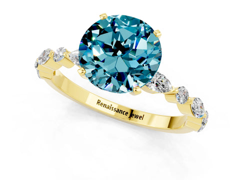 Yellow gold Round Cut Blue Topaz Solitaire with Side Stones on a Pavé Band and Four-Prong Setting_1