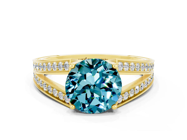 Yellow gold Round Cut Blue Topaz Split Shank Ring with Pavé Band and Four-Prong Setting