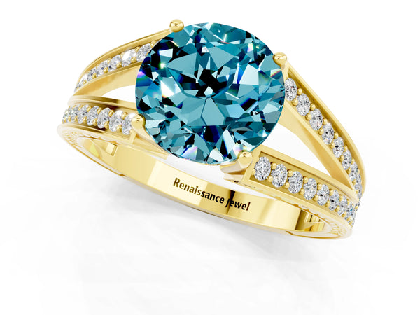 Yellow gold Round Cut Blue Topaz Split Shank Ring with Pavé Band and Four-Prong Setting