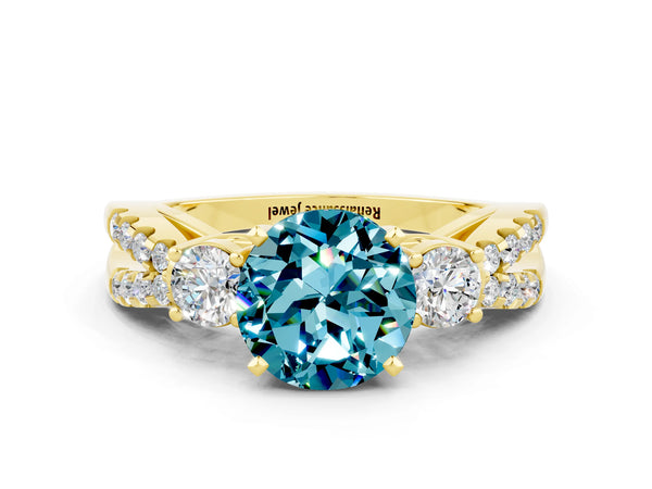Yellow gold Round Cut Blue Topaz Three-Stone Ring with Pavé Split Shank and Four-Prong Setting