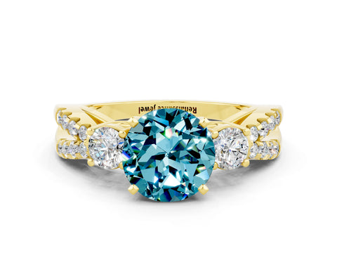 Yellow gold Round Cut Blue Topaz Three-Stone Ring with Pavé Split Shank and Four-Prong Setting