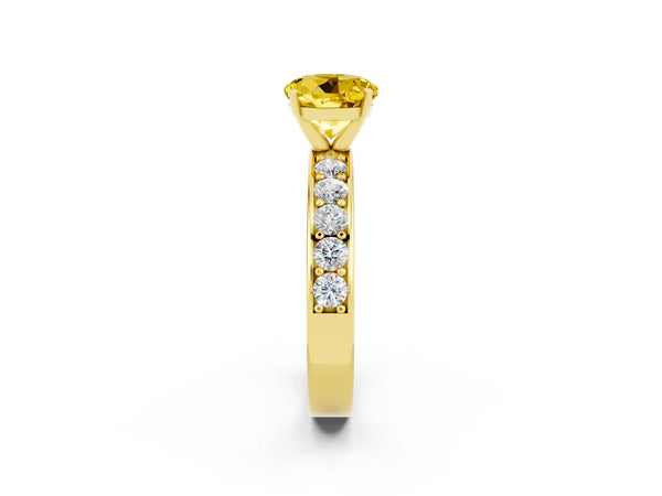 Yellow gold Round Cut Yellow Sapphire Engagement Ring with Channel Set Round Band and Prong Setting