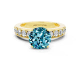 Yellow gold Round Cut Cut Channel Set Diamond Engagement Ring with Four-Prong Setting