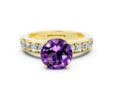 Yellow gold Round Cut Cut Channel Set Diamond Engagement Ring with Four-Prong Setting