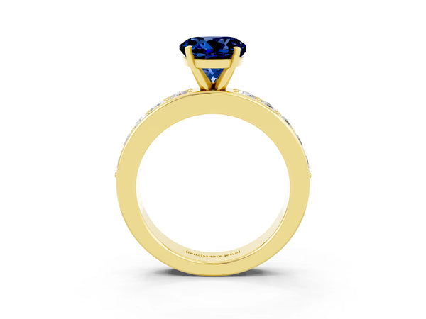 Yellow gold Round Cut Blue Sapphire Engagement Ring with Channel Set Round Band and Prong Setting