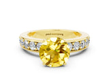 Yellow gold Round Cut Cut Channel Set Diamond Engagement Ring with Four-Prong Setting