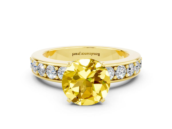 Yellow gold Round Cut Yellow Sapphire Engagement Ring with Channel Set Round Band and Prong Setting