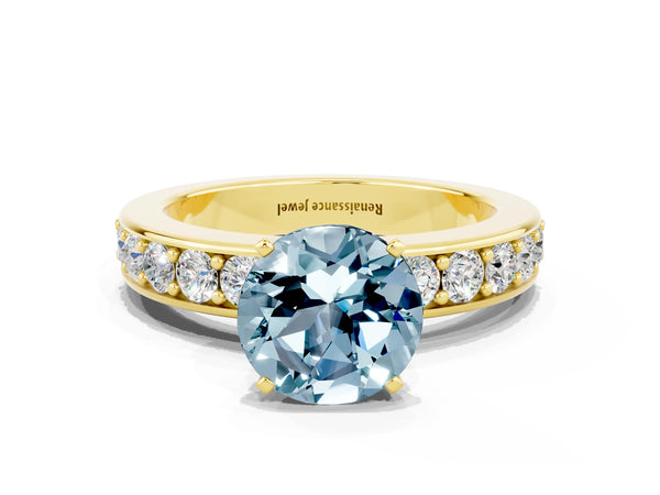 Yellow gold Round Cut Aquamarine Engagement Ring with Channel Set Round Band and Prong Setting