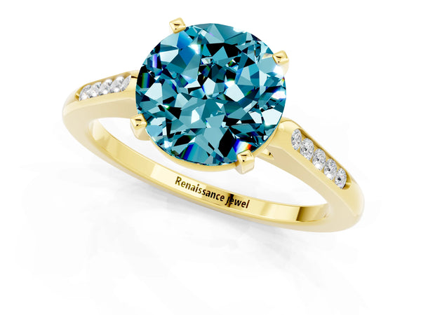 Yellow gold Round Cut Blue Topaz Solitaire Ring with Channel Set Round Band and Prong Setting