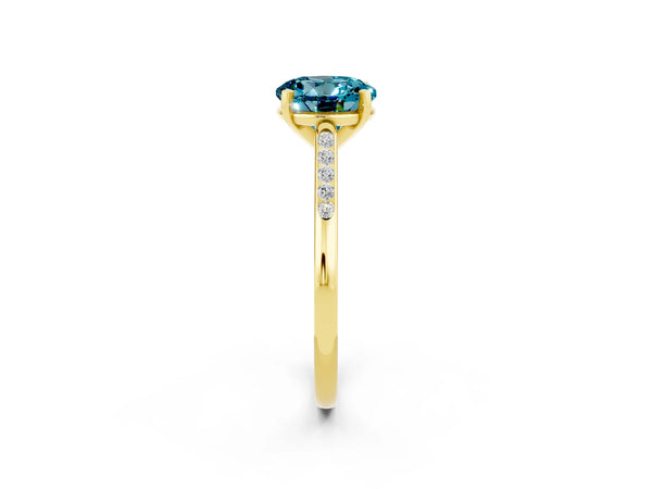 Yellow gold Round Cut Blue Topaz Solitaire Ring with Channel Set Round Band and Prong Setting