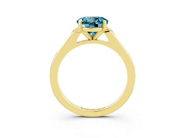Yellow gold Round Cut Blue Topaz Solitaire Ring with Channel Set Round Band and Prong Setting