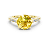 Yellow gold Round Cut Cut Channel Set Solitaire Engagement Ring with Four-Prong Setting