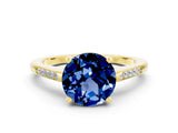 Yellow gold Round Cut Cut Channel Set Solitaire Engagement Ring with Four-Prong Setting