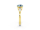 Yellow gold Round Cut Cut Diamond Ring with Tapered Baguette Side Stones in Four-Prong Setting_2