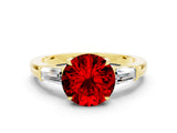 Yellow gold Round Cut Cut Diamond Ring with Tapered Baguette Side Stones in Four-Prong Setting