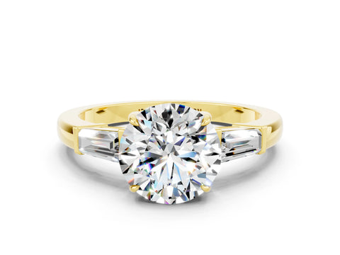 Yellow gold Round Cut Cut Diamond Ring with Tapered Baguette Side Stones in Four-Prong Setting