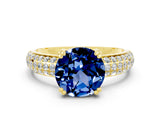 Yellow gold Round Cut Cut Pave Diamond Engagement Ring with Channel Set Band and Four-Prong Setting