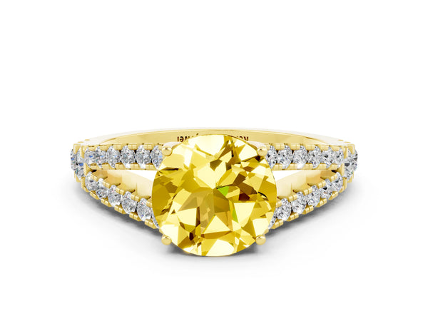Yellow gold Round Cut Yellow Sapphire Split Shank Engagement Ring with Round Pavé and Prong Setting