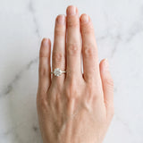Yellow gold Round Cut Diamond Brilliant Solitaire Ring with Pavé Band and Four-Prong Setting
