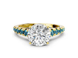 Yellow gold Round Cut Diamond Cathedral Solitaire Ring with Round with Blue Topaz side stone Pavé Band