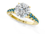 Yellow gold Round Cut Diamond Cathedral Solitaire Ring with Round with Blue Topaz side stone Pavé Band_1