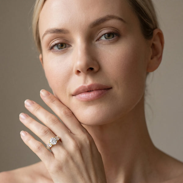 Yellow gold Round Cut Diamond Engagement Ring with Baguette Side Stones and Channel Set Band