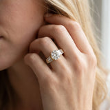 Yellow gold Round Cut Diamond Engagement Ring with Baguette Side Stones and Channel Set Band_15