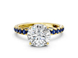 Yellow gold Round Cut Diamond Pave Band Solitaire Ring with Round with Blue Sapphire side stone and Prong Setting_24