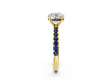 Yellow gold Round Cut Diamond Pave Band Solitaire Ring with Round with Blue Sapphire side stone and Prong Setting_26