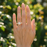 Yellow gold Round Cut Diamond Prong Setting with Side Stones on a Pave Band_157