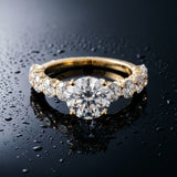 Yellow gold Round Cut Diamond Prong Setting with Side Stones on a Pave Band_160