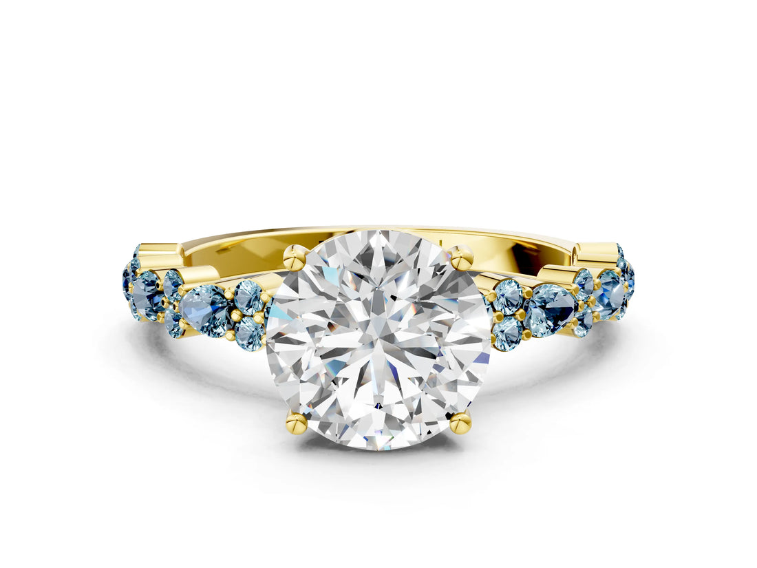 Yellow gold Round Cut Diamond Side Stone Solitaire Ring with Round with Aquamarine side stone and Four-Prong Setting