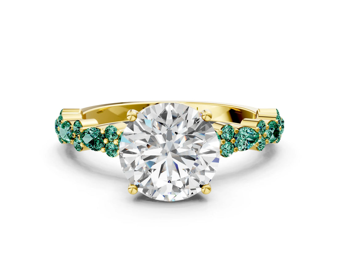 Yellow gold Round Cut Diamond Side Stone Solitaire Ring with Round with Green Sapphire side stone and Four-Prong Setting